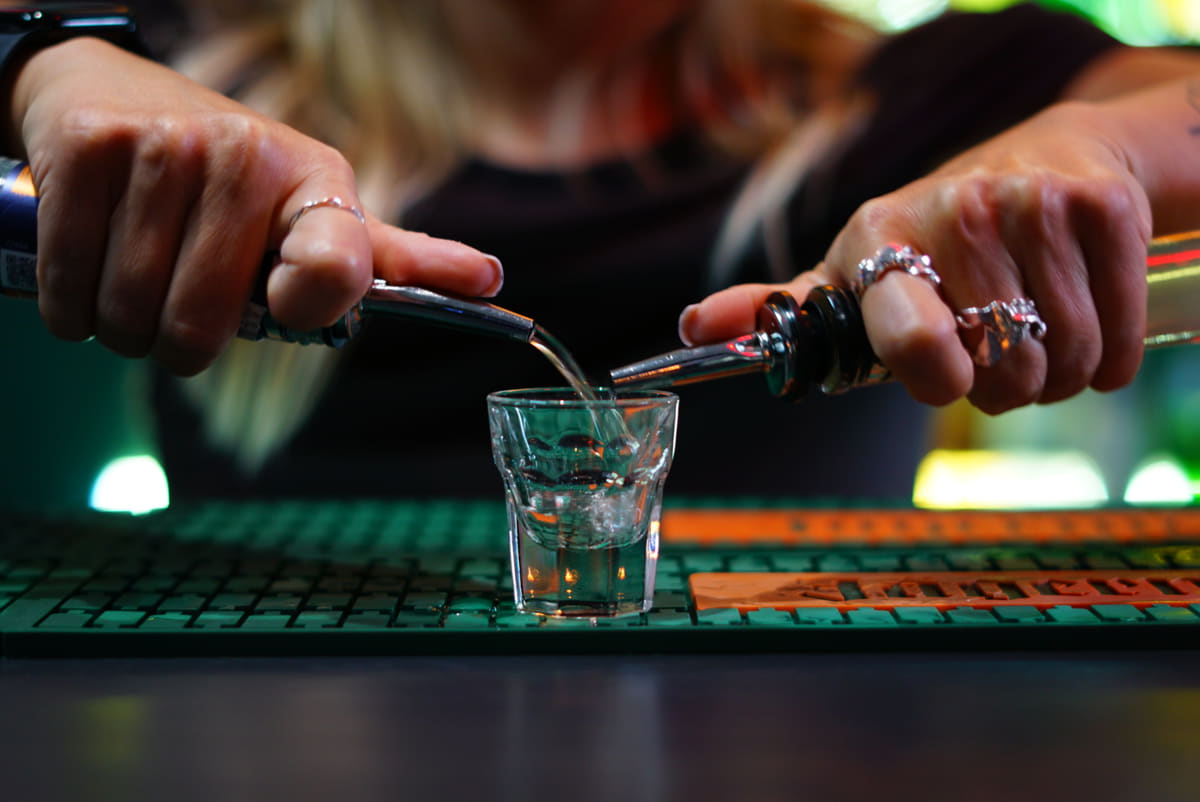 Bartender mixing